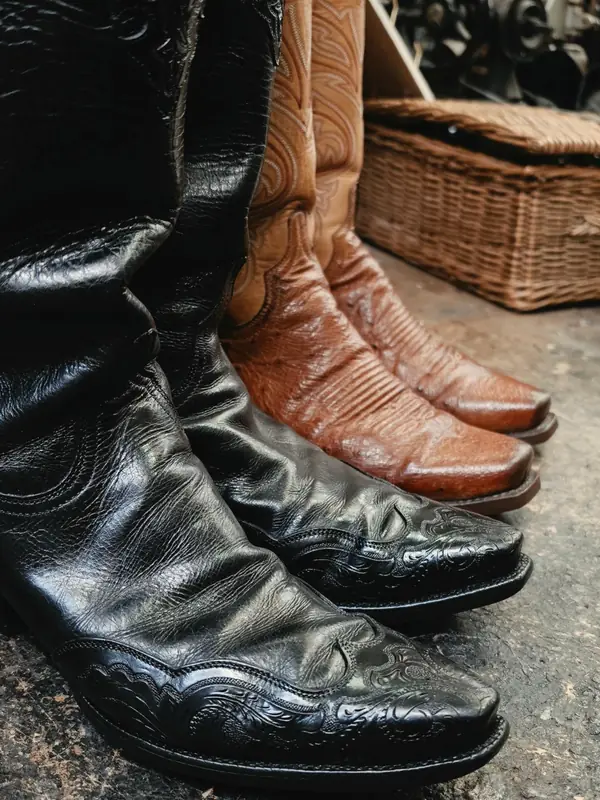 Black and tan leather cowboy boots