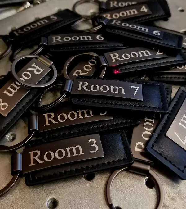 Leather keyrings engraved with room numbers