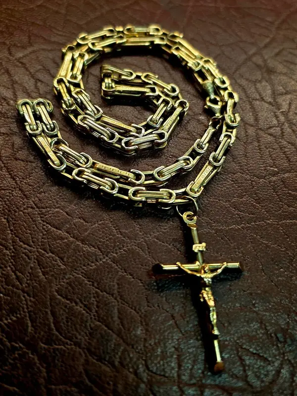 Gold chain with a crucifix pendant