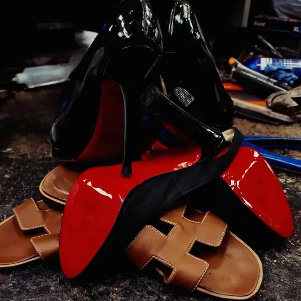Christian Louboutin heels and Hermès sandals