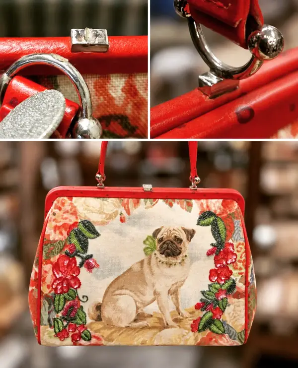 Tapestry handbag with a pug design and its repaired clasp
