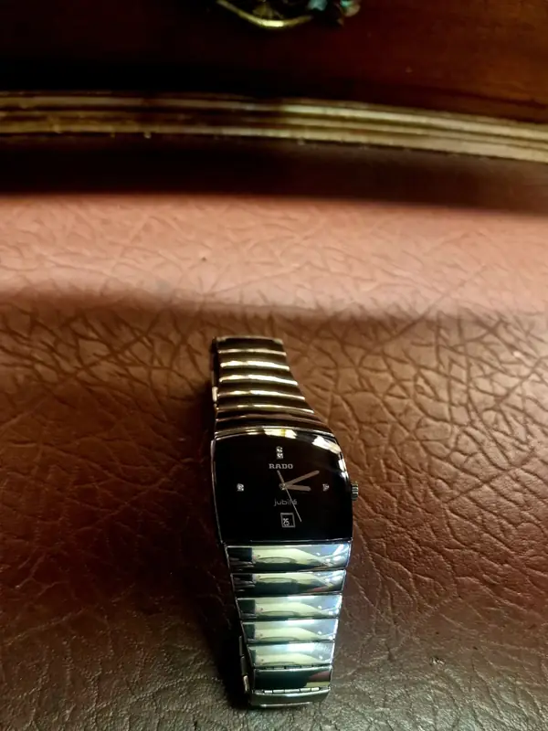 Rado watch on a leather stand