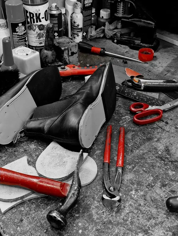 The shoe repair bench in black and white