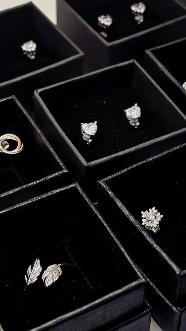 Silver earrings in gift boxes