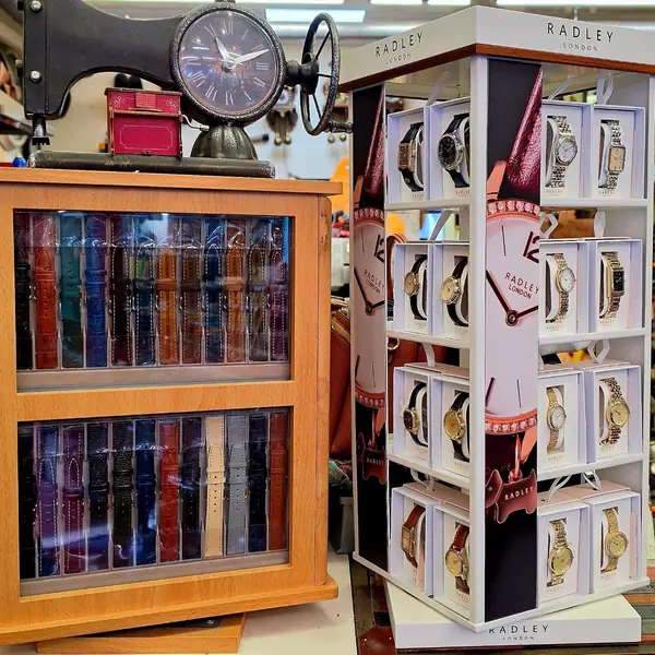 Watch strap cabinet and Radley watch stand in the shop